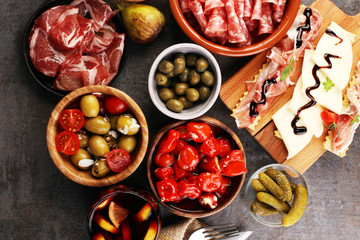 spanish tapas and sangria on wooden table - mediterran antipasti set