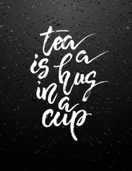 Tea is a hug in a cup. Hand drawn calligraphy