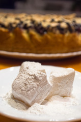 Turkish delight or rahat-lokum on a white saucer