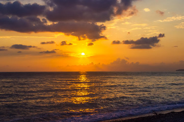Amazing sea sunset, the sun, waves, clouds
