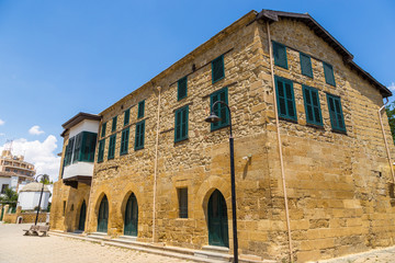 Fototapeta premium Old building with green shutter in the centre of Nicosia, Cyprus