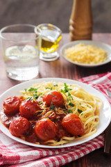 Plate of pasta with cherry tomatoes and olive oil