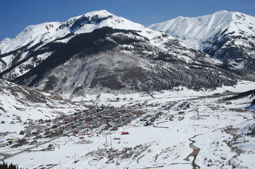 Colorado Mountain Town: New spring snow covers the San Juan Mountains surrounding Silverton,...