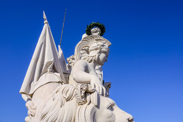 The amazing statues on the top of famous Augusta Street Arch in Lisbon - LISBON - PORTUGAL - JUNE 17, 2017