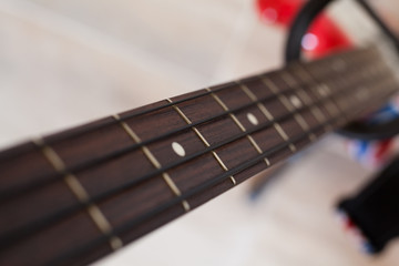 Bass pictured from above with selective focus on the fretboard