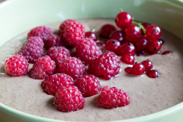Summer breakfast - breakfast bowl with raspberries and currants