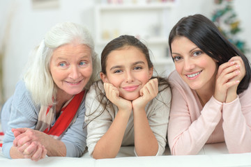 child with her mother and grandmother