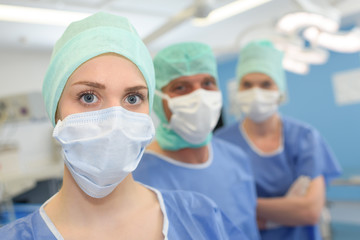 Fototapeta na wymiar Row in medical staff wearing masks