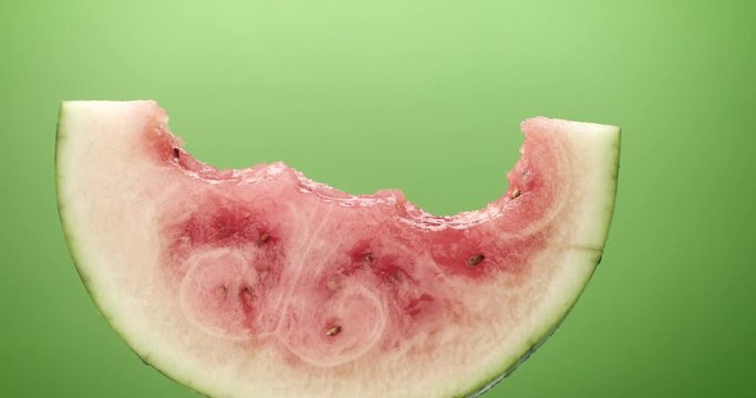 invisible being person eats a water-melon slice