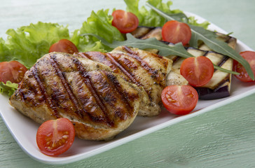 Grilled chicken steak grilled with vegetables