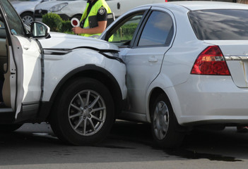 Car accident with damaged automobiles