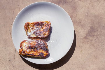 French toast on concrete background 