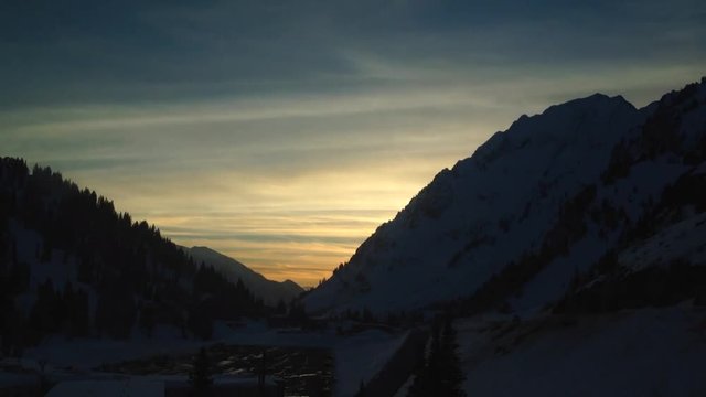 Sun sets on the Wasatch Range in Utah at Alta Ski Area