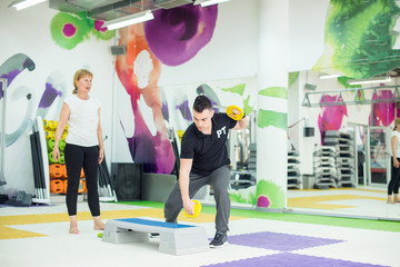 Fototapeta premium Showing arms exercise