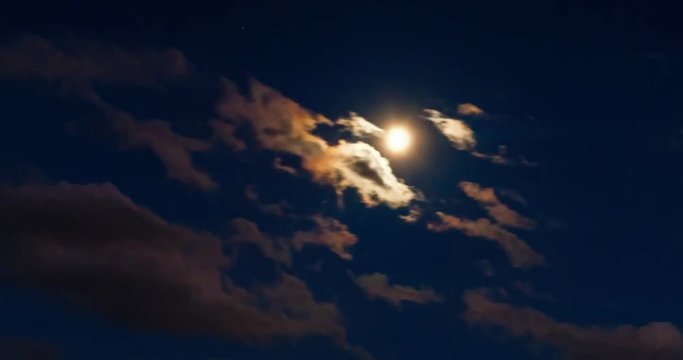 Time lapse film. Moon in the night sky