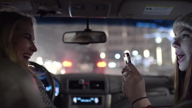 Passenger Takes Funny Photos Of Driver At A Stop Light, Then They Realize The Light Turned Green