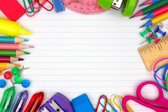 Colorful school supplies frame over a lined paper background