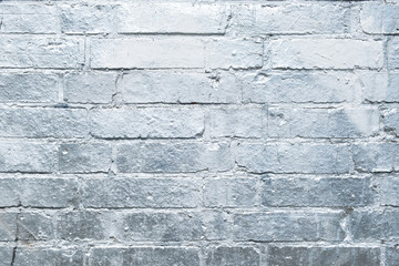 brick  wall  painted in silver, graffiti background