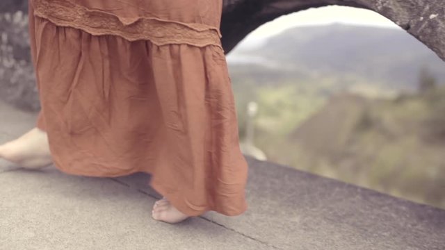 Closeup Of Young Woman's Bare Feet, As She Walks Along Scenic Overlook In Oregon (Slow Motion)