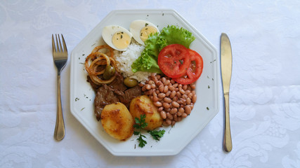 Traditional brazilian food dish top view with white background