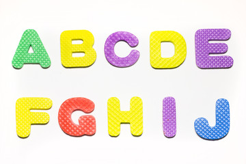 Sponge rubber alphabet colorful font style.