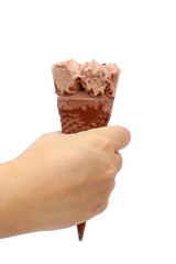 lady hand holding melted chocolate ice cream and missing bite isolated on white