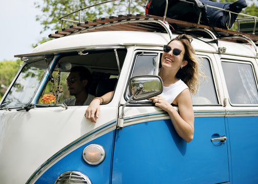 Woman Sitting In A Car Put Head Out Of Window Wind Blowing Her Hair