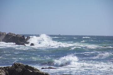 Waves Crash on Rocks  along 17 mile drive Pebble Beach California