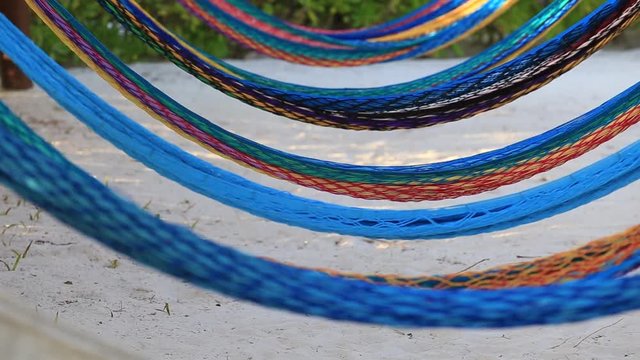 Colorful empty hammocks