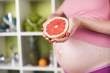 Pregnancy, healthy food and people concept