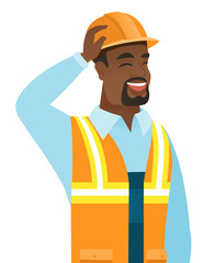 Young african-american builder laughing.
