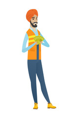 Fototapeta premium Happy hindu builder holding money.