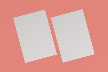 Obraz na płótnie Canvas Two blank white flyers mockup on red background