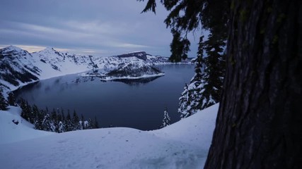 Camera Pans, From Left To Right, Wide Angle View Of Crater Lake At Sunset In Winter (Crater Lake National Park In Oregon, USA)