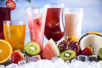 Fresh tropical fruits, Summer drink and palm branch
