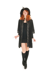 Evil witch walking isolated over white background