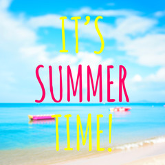 Colorful text, IT'S SUMMER TIME, on blur beach background