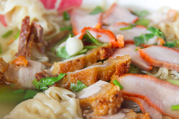 Crispy pork  in noodle bowl