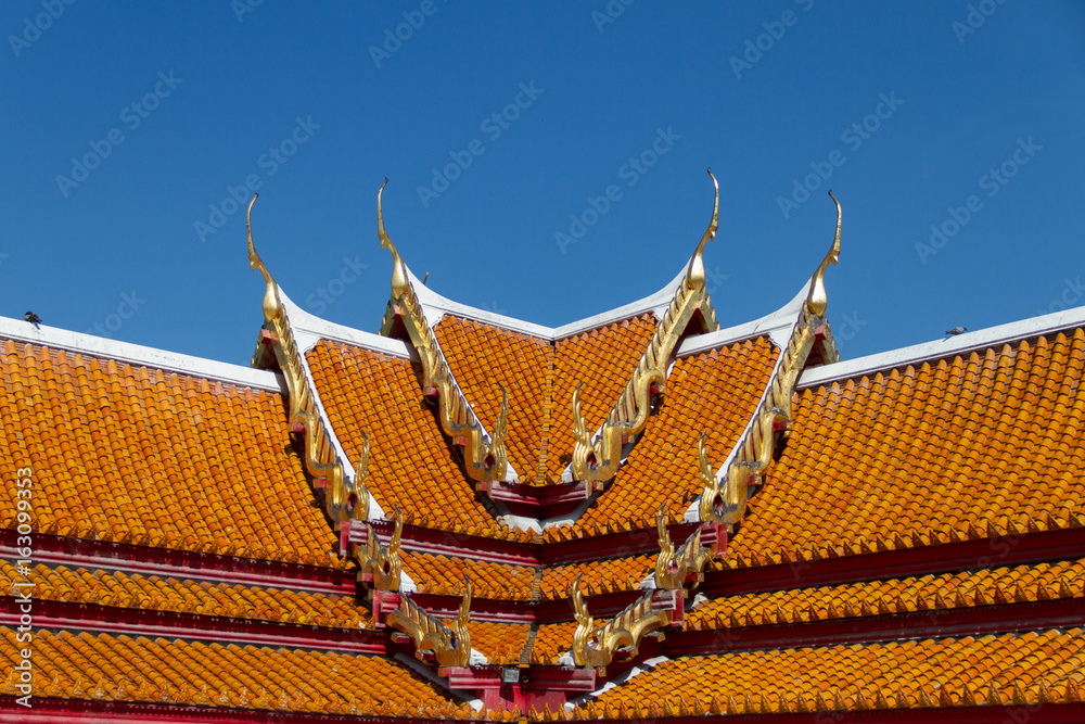 Wall mural church roof of a temple in thailand