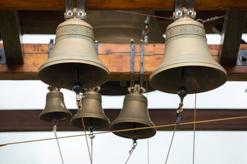 New bronze bells on  beam in belfry