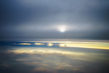 Dramatic clouds from airplane perspective.