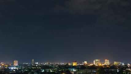 Fototapeta na wymiar landscape city night with dramatic moody dark sky