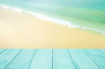 Wooden floor with blurred landscape nature view of beach in the background