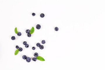 Fresh blueberry with leaf on white background