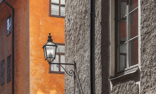 Old house facade with street lamp. Stockholm