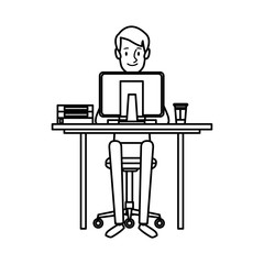 young man working on computer at office desk