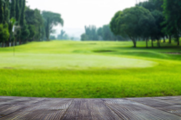 Wooden background with beautiful old temple in the night with light reflect in the water