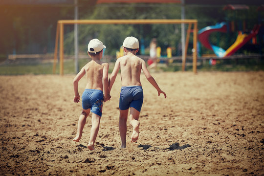 Kids Running On The Beach