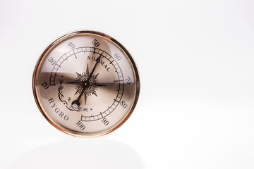 Vintage hygrometer isolated on white background