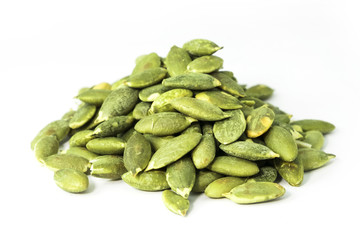 Pumpkin seeds on a white background